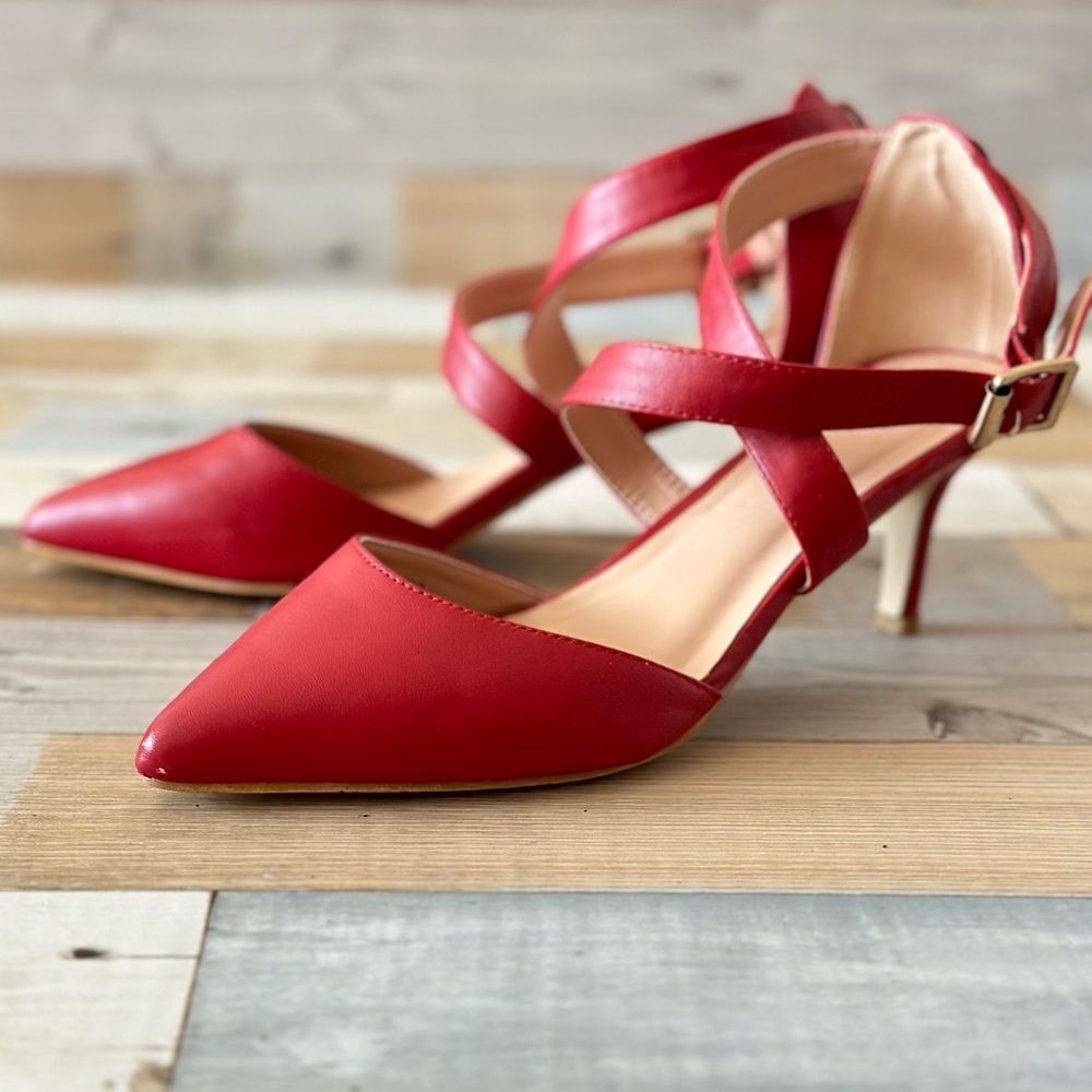 Red pointed toe heels with ankle wrap strap